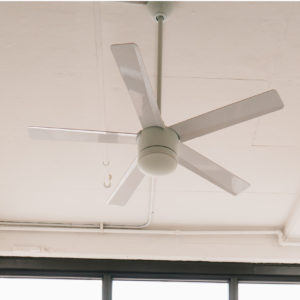 ceiling fan above a multi-paned window