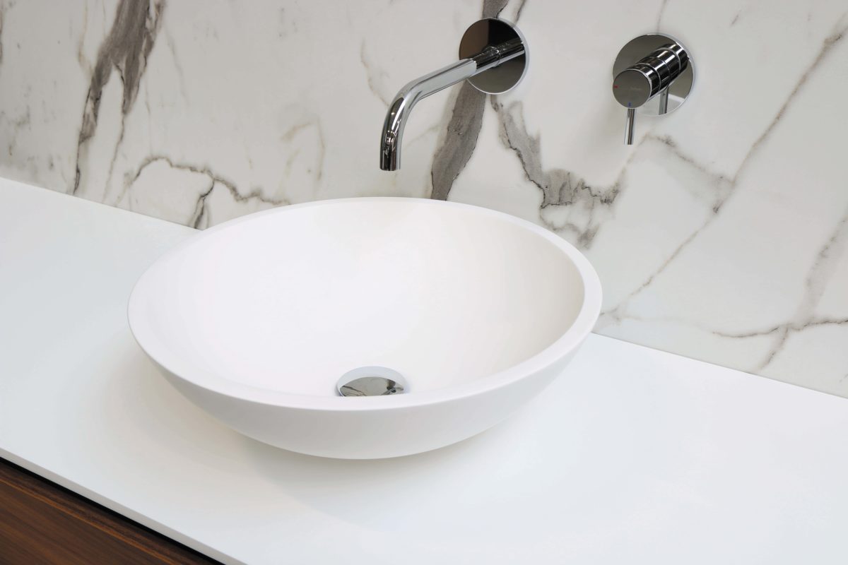 bowl sink with modern faucet